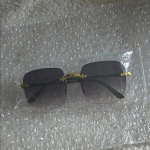 Stylish Gold and Black Sunglasses